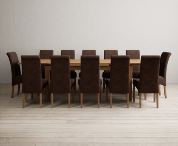 View Extending buxton 180cm solid oak dining table with 12 natural scroll back chairs View Extending buxton 180cm solid oak dining table with 12 natural scroll back chairs