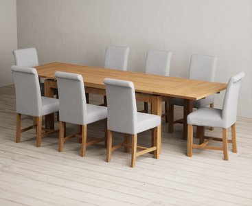 View Extending buxton 180cm solid oak dining table with 10 grey scroll back chairs View Extending buxton 180cm solid oak dining table with 10 grey scroll back chairs