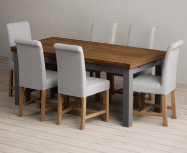 View Extending buxton 180cm oak and charcoal grey painted dining table with 8 grey scroll back chairs View Extending buxton 180cm oak and charcoal grey painted dining table with 8 grey scroll back chairs
