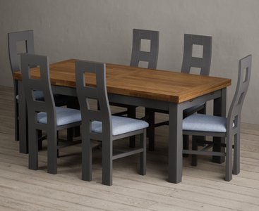 View Extending buxton 180cm oak and charcoal grey painted dining table with 12 light grey painted chairs View Extending buxton 180cm oak and charcoal grey painted dining table with 12 light grey painted chairs