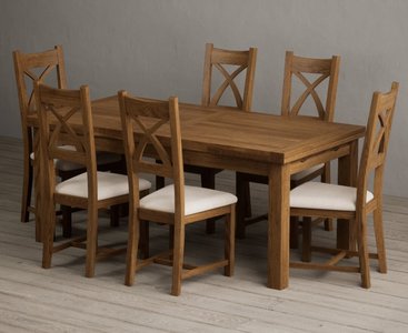 View Extending buxton 180cm rustic solid oak dining table with 12 linen rustic solid oak chairs View Extending buxton 180cm rustic solid oak dining table with 12 linen rustic solid oak chairs