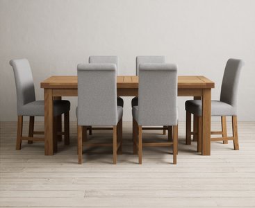 View Extending buxton 180cm solid oak dining table with 12 brown scroll back chairs View Extending buxton 180cm solid oak dining table with 12 brown scroll back chairs