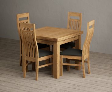 View Extending buxton 90cm solid oak dining table with 6 black chairs View Extending buxton 90cm solid oak dining table with 6 black chairs