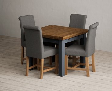 View Extending buxton 90cm oak and dark blue painted dining table with 4 blue scroll back chairs View Extending buxton 90cm oak and dark blue painted dining table with 4 blue scroll back chairs