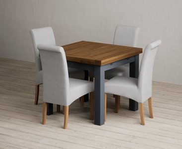 View Extending buxton 90cm oak and dark blue painted dining table with 4 blue scroll back chairs View Extending buxton 90cm oak and dark blue painted dining table with 4 blue scroll back chairs