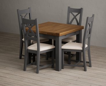 View Extending buxton 90cm oak and charcoal grey painted dining table with 4 light grey painted chairs View Extending buxton 90cm oak and charcoal grey painted dining table with 4 light grey painted chairs