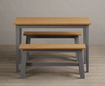 View Kendal 115cm solid oak and light grey painted dining table with 2 grey benches View Kendal 115cm solid oak and light grey painted dining table with 2 grey benches