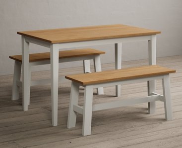 View Kendal 115cm solid oak and signal white painted dining table with 2 oak and white benches View Kendal 115cm solid oak and signal white painted dining table with 2 oak and white benches