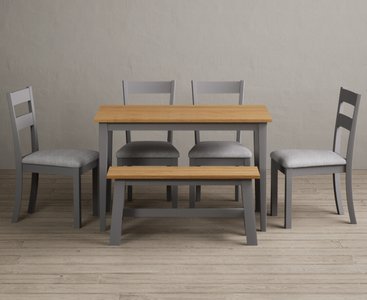 View Kendal 115cm solid oak and light grey painted dining table with 4 light grey kendal chairs with 1 oak and grey bench View Kendal 115cm solid oak and light grey painted dining table with 4 light grey kendal chairs with 1 oak and grey bench