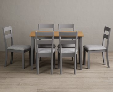 View Kendal 115cm solid oak and light grey painted dining table with 4 light grey kendal chairs View Kendal 115cm solid oak and light grey painted dining table with 4 light grey kendal chairs