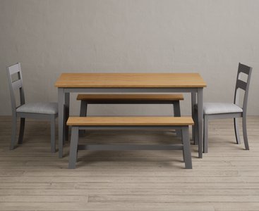 View Kendal 150cm solid oak and light grey painted dining table with 4 light grey kendal chairs with 2 oak and grey benches View Kendal 150cm solid oak and light grey painted dining table with 4 light grey kendal chairs with 2 oak and grey benches