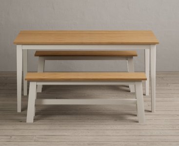 View Kendal 150cm solid oak and cream painted dining table with 2 cream benches View Kendal 150cm solid oak and cream painted dining table with 2 cream benches