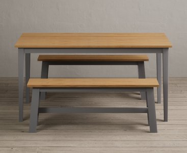 View Kendal 150cm solid oak and light grey painted dining table with 2 grey benches View Kendal 150cm solid oak and light grey painted dining table with 2 grey benches