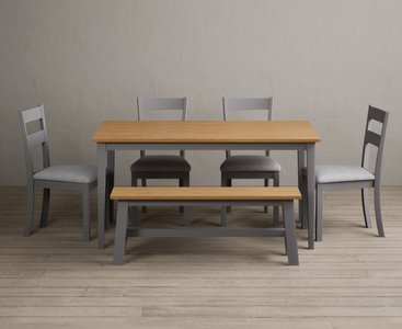 View Kendal 150cm solid oak and light grey painted dining table with 2 light grey kendal chairs with 2 grey benches View Kendal 150cm solid oak and light grey painted dining table with 2 light grey kendal chairs with 2 grey benches
