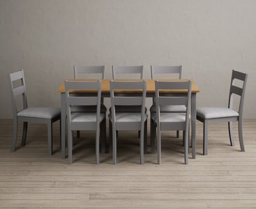 View Kendal 150cm solid oak and light grey painted dining table with 8 light grey kendal chairs View Kendal 150cm solid oak and light grey painted dining table with 8 light grey kendal chairs