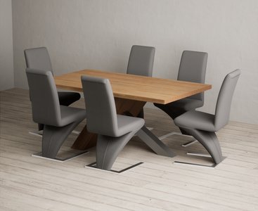 View Michigan 180cm solid oak and metal industrial dining table with 8 grey aldo chairs View Michigan 180cm solid oak and metal industrial dining table with 8 grey aldo chairs