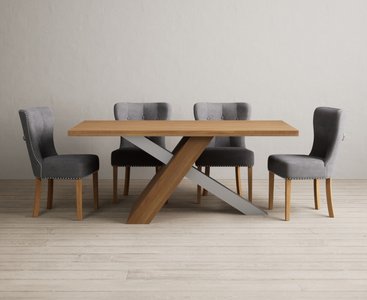 View Michigan 180cm solid oak and metal industrial dining table with 8 grey keswick chairs View Michigan 180cm solid oak and metal industrial dining table with 8 grey keswick chairs