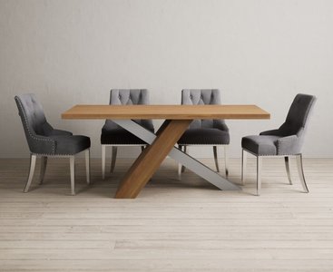 View Michigan 180cm solid oak and metal industrial dining table with 6 grey sienna chairs View Michigan 180cm solid oak and metal industrial dining table with 6 grey sienna chairs