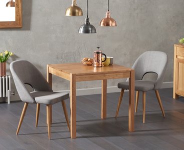 View York 80cm solid oak dining table with 4 grey chairs View York 80cm solid oak dining table with 4 grey chairs
