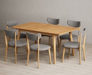 View Extending ruben 150cm retro oak dining table with 10 white nordic chairs View Extending ruben 150cm retro oak dining table with 10 white nordic chairs