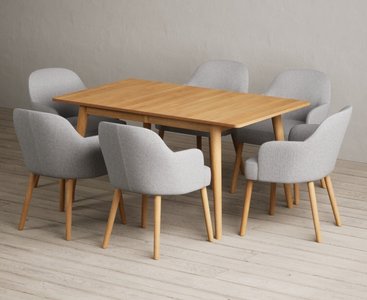 View Extending ruben 150cm retro oak dining table with 10 light grey oliver chairs View Extending ruben 150cm retro oak dining table with 10 light grey oliver chairs