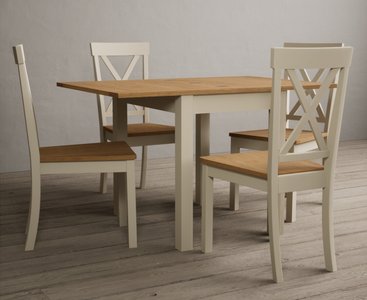 View Extending hadleigh oak and cream painted dining table with 2 blue hertford chairs View Extending hadleigh oak and cream painted dining table with 2 blue hertford chairs