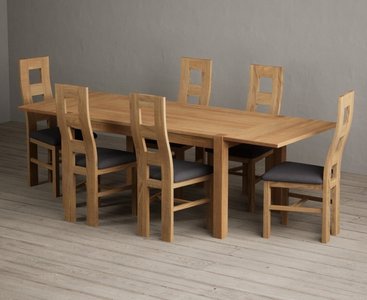 View Thetford 150cm oak dining table with thetford 45cm oak extensions with 10 light grey natural chairs View Thetford 150cm oak dining table with thetford 45cm oak extensions with 10 light grey natural chairs