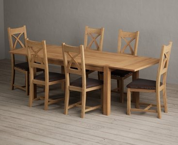 View Thetford 150cm oak dining table with thetford 45cm oak extensions with 10 light grey natural solid oak chairs View Thetford 150cm oak dining table with thetford 45cm oak extensions with 10 light grey natural solid oak chairs