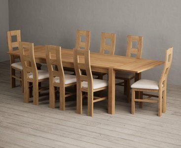View Thetford 180cm oak dining table with thetford 45cm oak extensions with 10 light grey natural chairs View Thetford 180cm oak dining table with thetford 45cm oak extensions with 10 light grey natural chairs