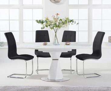 View Venosa 120cm round white dining table with 4 white vigo chairs View Venosa 120cm round white dining table with 4 white vigo chairs