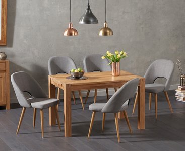View Thetford 120cm oak dining table with 4 grey chairs View Thetford 120cm oak dining table with 4 grey chairs