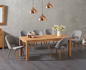 View Thetford 180cm oak dining table with 8 grey chairs View Thetford 180cm oak dining table with 8 grey chairs