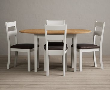 View Extending warwick oak and signal white painted dining table with 4 oak kendal chairs View Extending warwick oak and signal white painted dining table with 4 oak kendal chairs