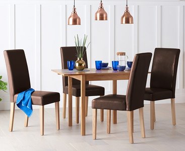 View Extending york 70cm solid oak drop leaf dining table with 2 black olivia chairs View Extending york 70cm solid oak drop leaf dining table with 2 black olivia chairs