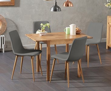 View Extending york 70cm solid oak drop leaf dining table with 4 grey chairs View Extending york 70cm solid oak drop leaf dining table with 4 grey chairs