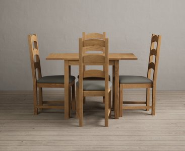 View Extending york 70cm solid oak drop leaf dining table with 2 black alton chairs View Extending york 70cm solid oak drop leaf dining table with 2 black alton chairs