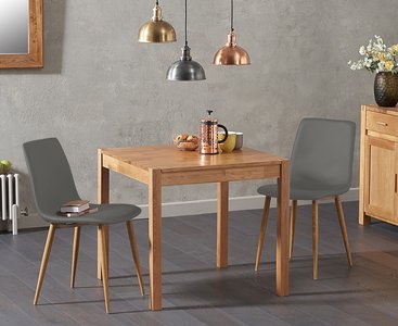 View York 80cm solid oak dining table with 4 grey chairs View York 80cm solid oak dining table with 4 grey chairs