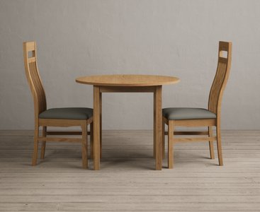 View Extending york 90cm solid oak dining table with 2 grey chairs View Extending york 90cm solid oak dining table with 2 grey chairs