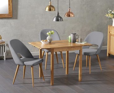 View Extending york 70cm solid oak drop leaf dining table with 4 grey chairs View Extending york 70cm solid oak drop leaf dining table with 4 grey chairs