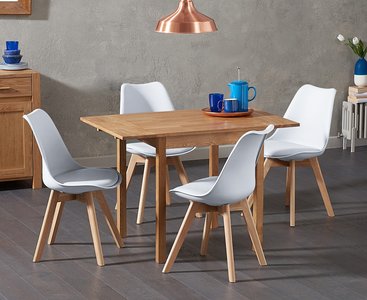View Extending york 70cm solid oak drop leaf dining table with 2 white orson chairs View Extending york 70cm solid oak drop leaf dining table with 2 white orson chairs