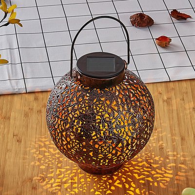 Lindby Dunjaris LED-Solarlaterne, Ornamente kupfer
