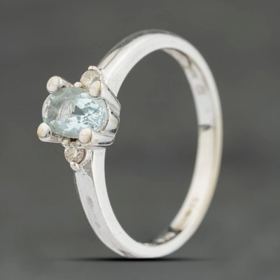Second Hand 9ct White Gold Aquamarine & Brilliant Cut Diamond Oval Three Stone Ring