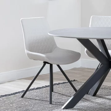 Clearance - boden dining chair - swivel - cream fabric - black legs