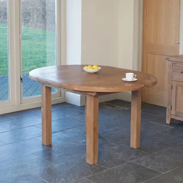 Hampshire oak round extending dining table - 4-6 seater - 107cm-145cm