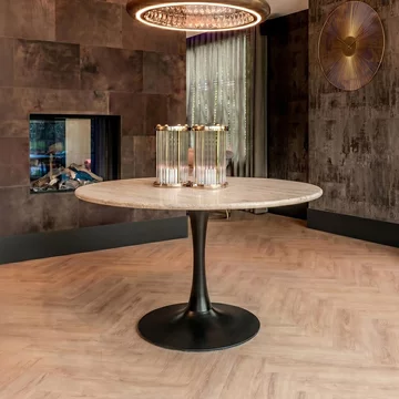 Hampton travertine beige 6 seater round dining table with black tulip base