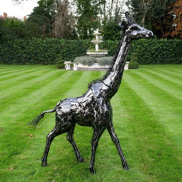 Black metal giraffe statue