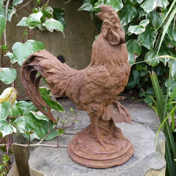 Rusty garden statue - small cockerel