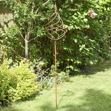 Rusty iron sphere ball garden sculpture