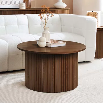 Axel round coffee table - walnut fluted