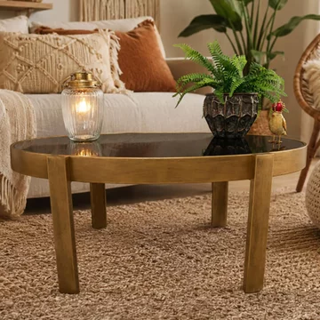 Coffee table - oval - black and gold - glass and metal